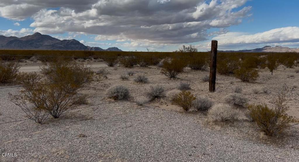 26 Cheyene Baker, CA 92309 - Photo 18 of 38 a view of a lake with a mountain in the background
