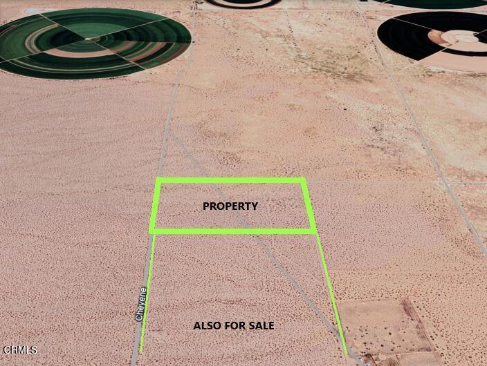 26 Cheyene Baker, CA 92309 - Photo 3 of 38 a sign that is on a brick wall