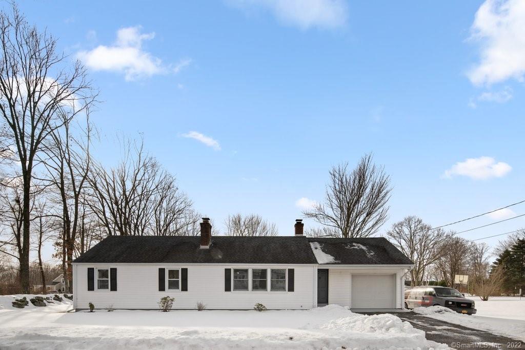 13 Sunset Lane Torrington, CT 06790 - Photo 1 of 1 a front view of a house with a yard