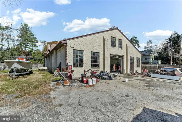 a view of a house with entrance gate