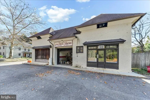 a front view of a house with a garage