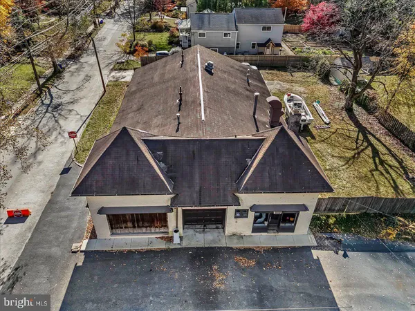 a stove top oven sitting inside of a kitchen