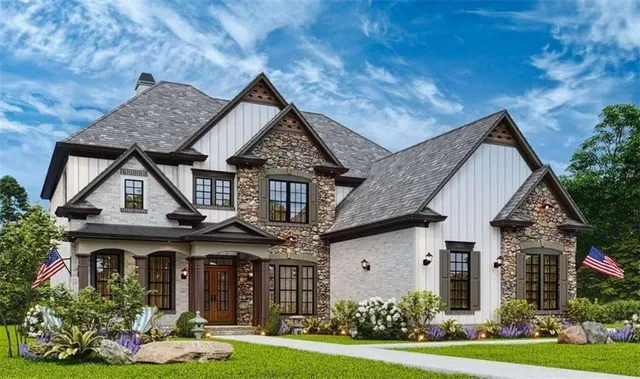 front view of a house with a yard