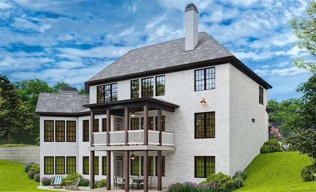 a view of a house with a yard and plants