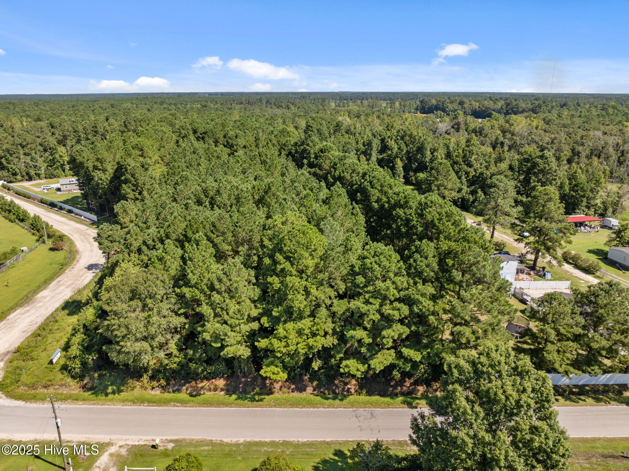 1784 Woodard Road Northwest Supply, NC 28462 - Photo 3 of 15 1-web-or-mls-DJI_20250827111213_0724_D