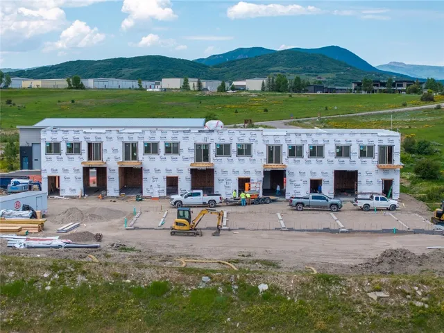 a view of a lake with a building in the background