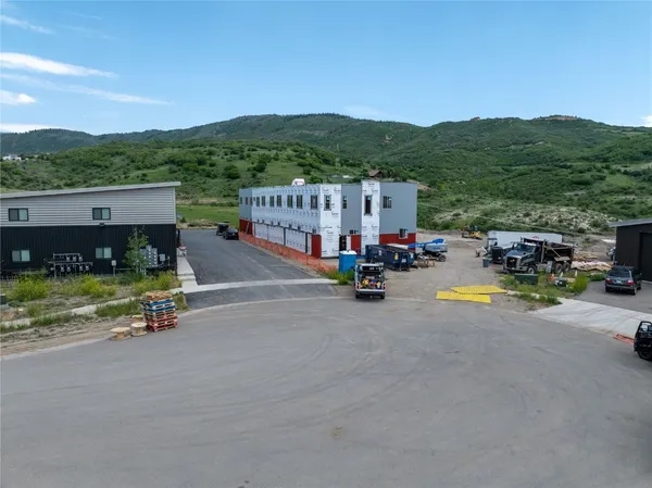 a view of a swimming pool with a lounge chair