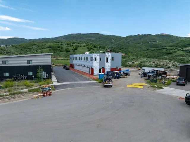 a view of a swimming pool with a lounge chair