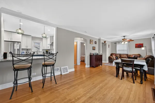 a view of a livingroom with furniture and wooden floor