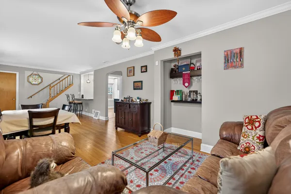 a living room with furniture and a rug