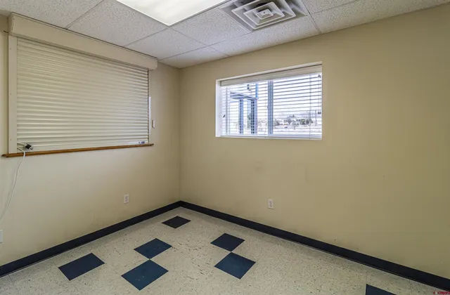 an empty room with windows