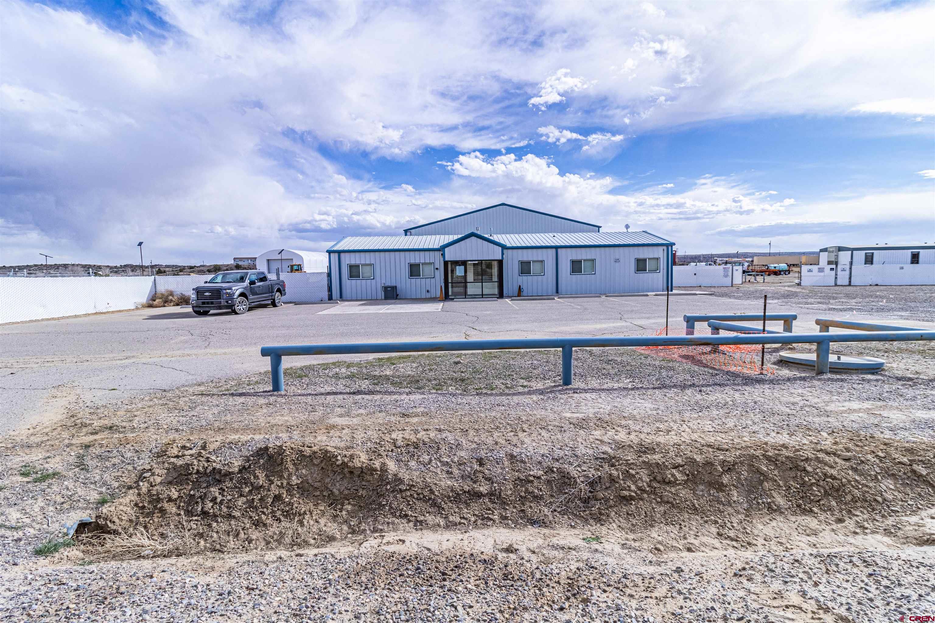 60 County Road 3961 Farmington, NM 87401 - Photo 4 of 35 a view of a house with a yard