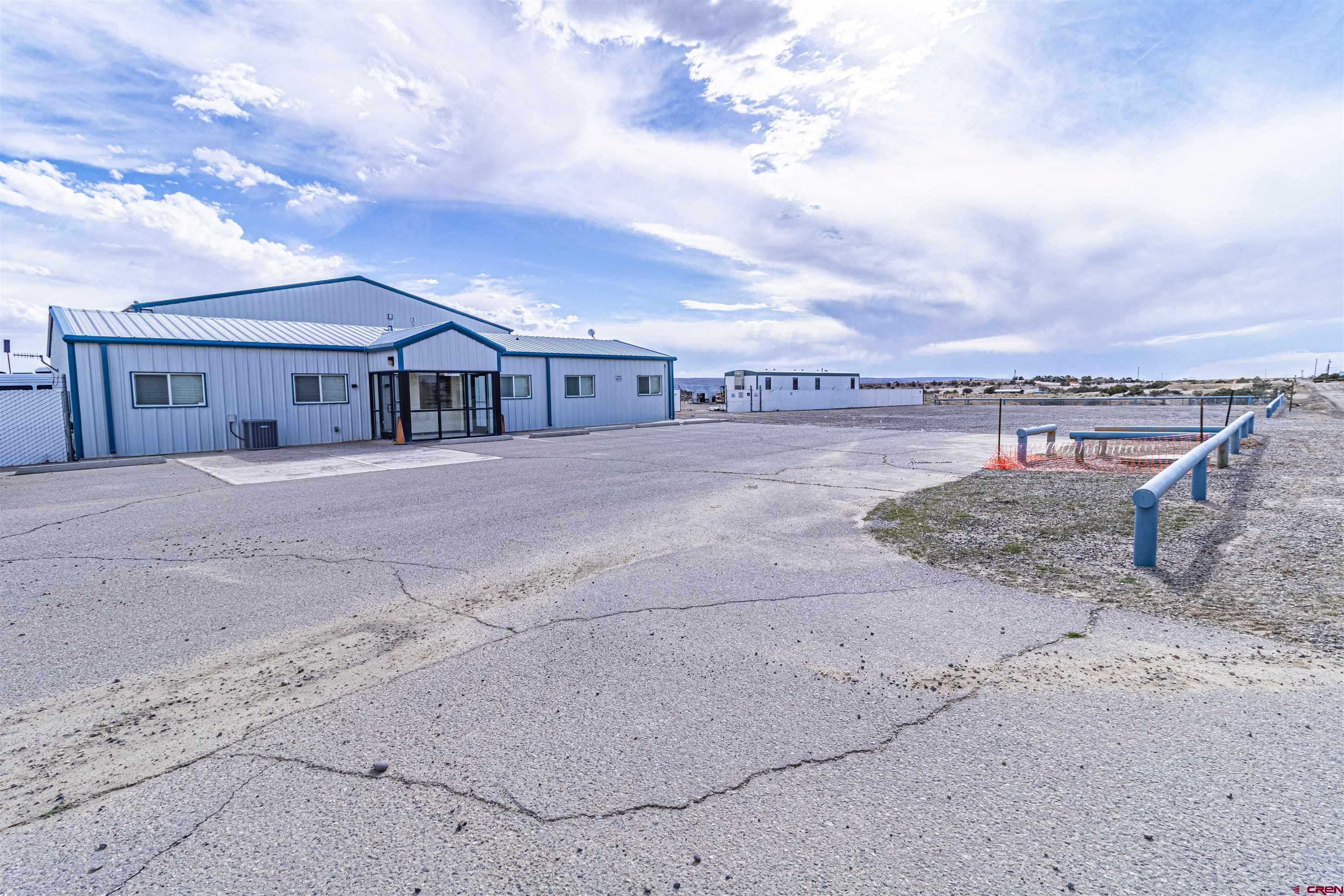 60 County Road 3961 Farmington, NM 87401 - Photo 5 of 35 front view of a house with a yard