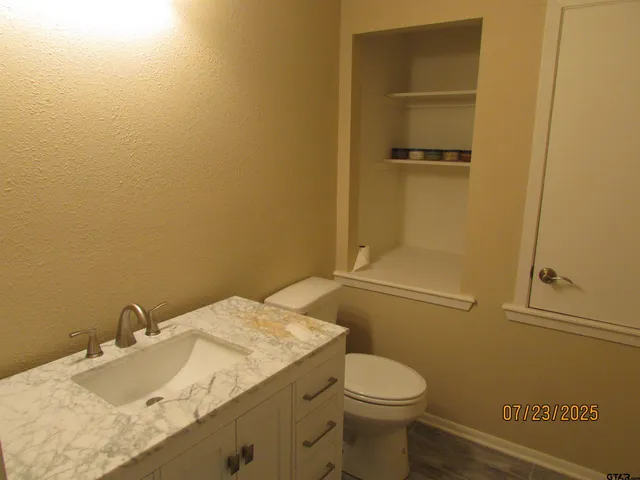 a view of hallway with a large window