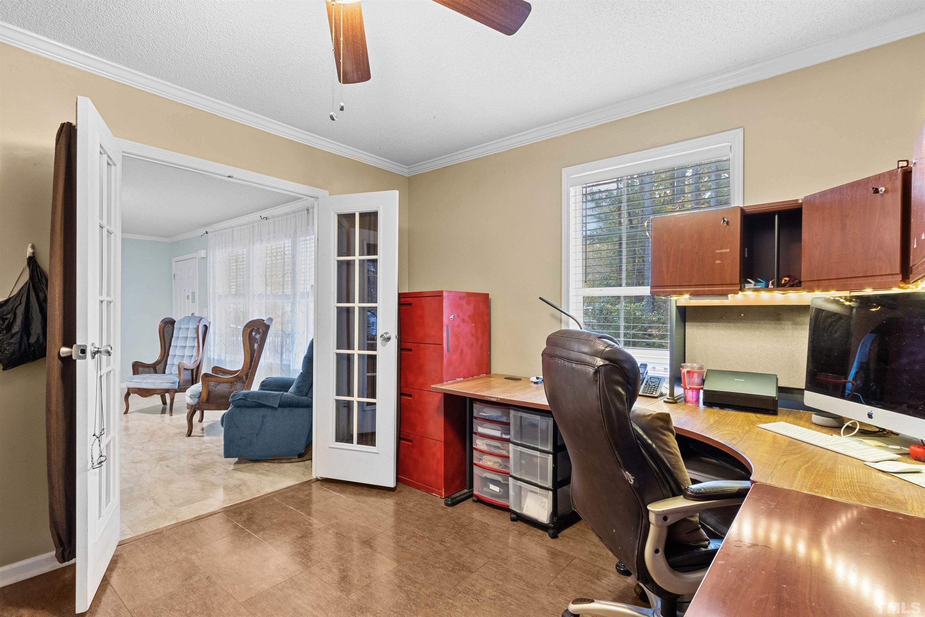 2710 Hurdover Road Apex, NC 27539 - Photo 19 of 52 a workspace with furniture