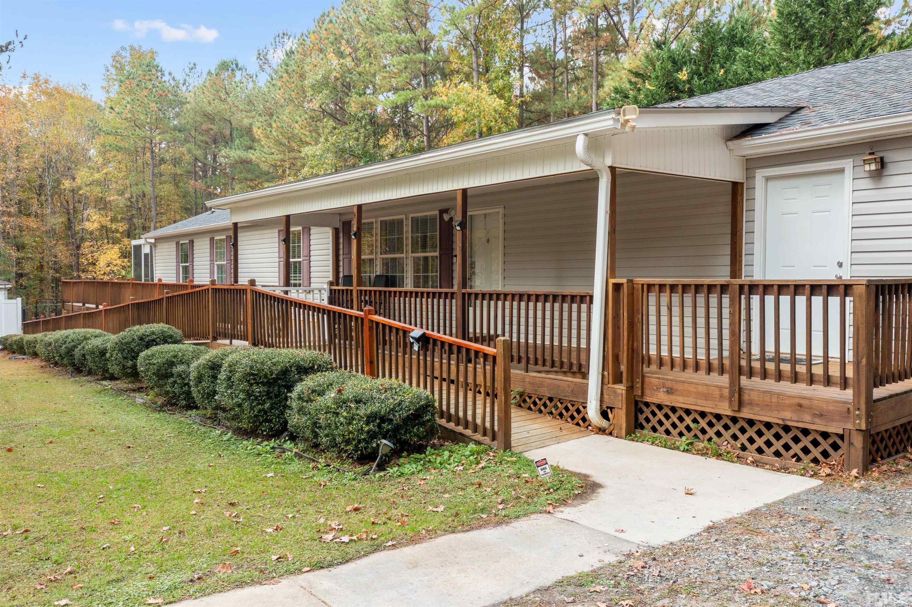 2710 Hurdover Road Apex, NC 27539 - Photo 3 of 52 a view of a house with a yard
