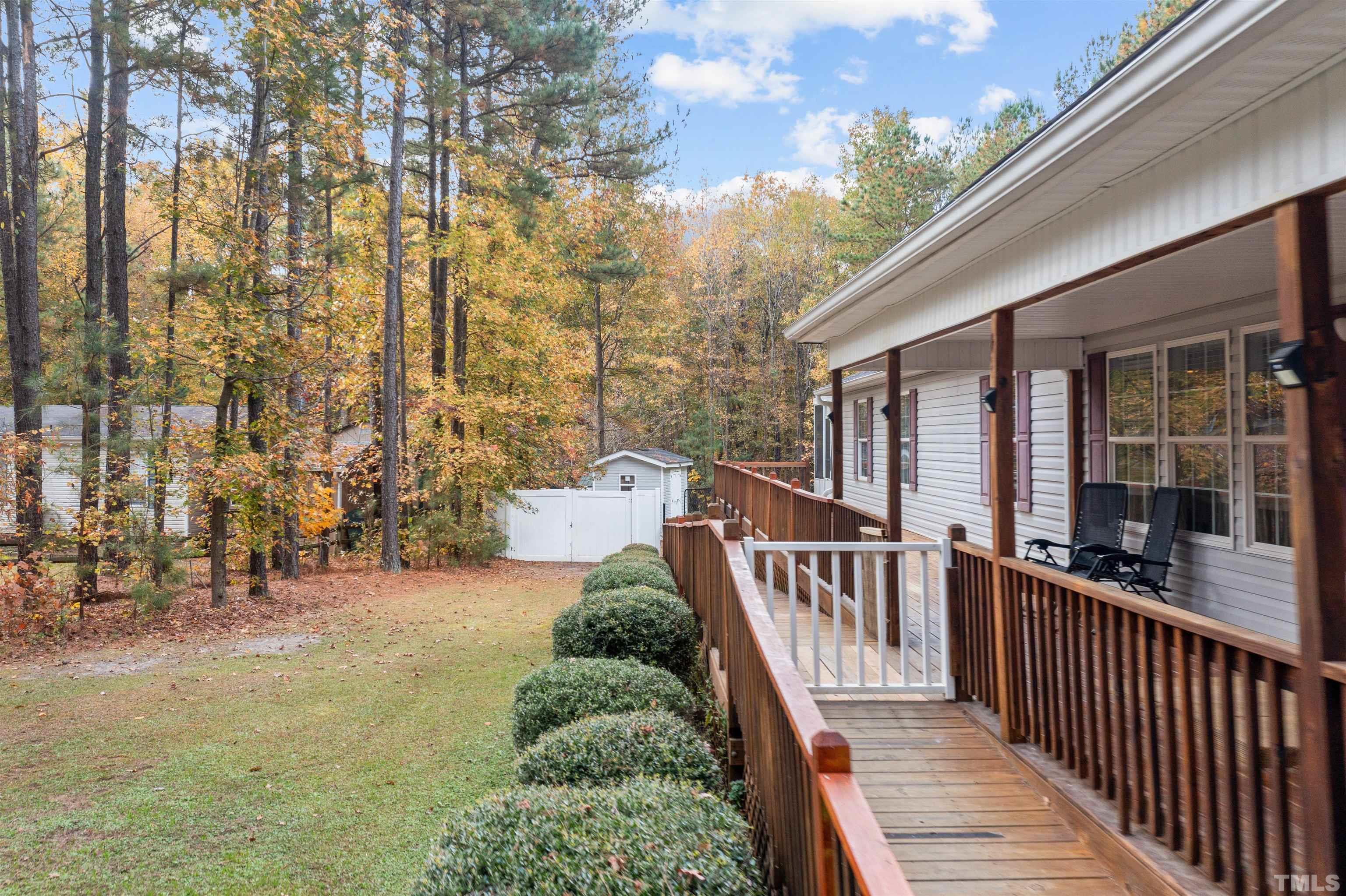 2710 Hurdover Road Apex, NC 27539 - Photo 4 of 52 a view of a house with backyard and porch