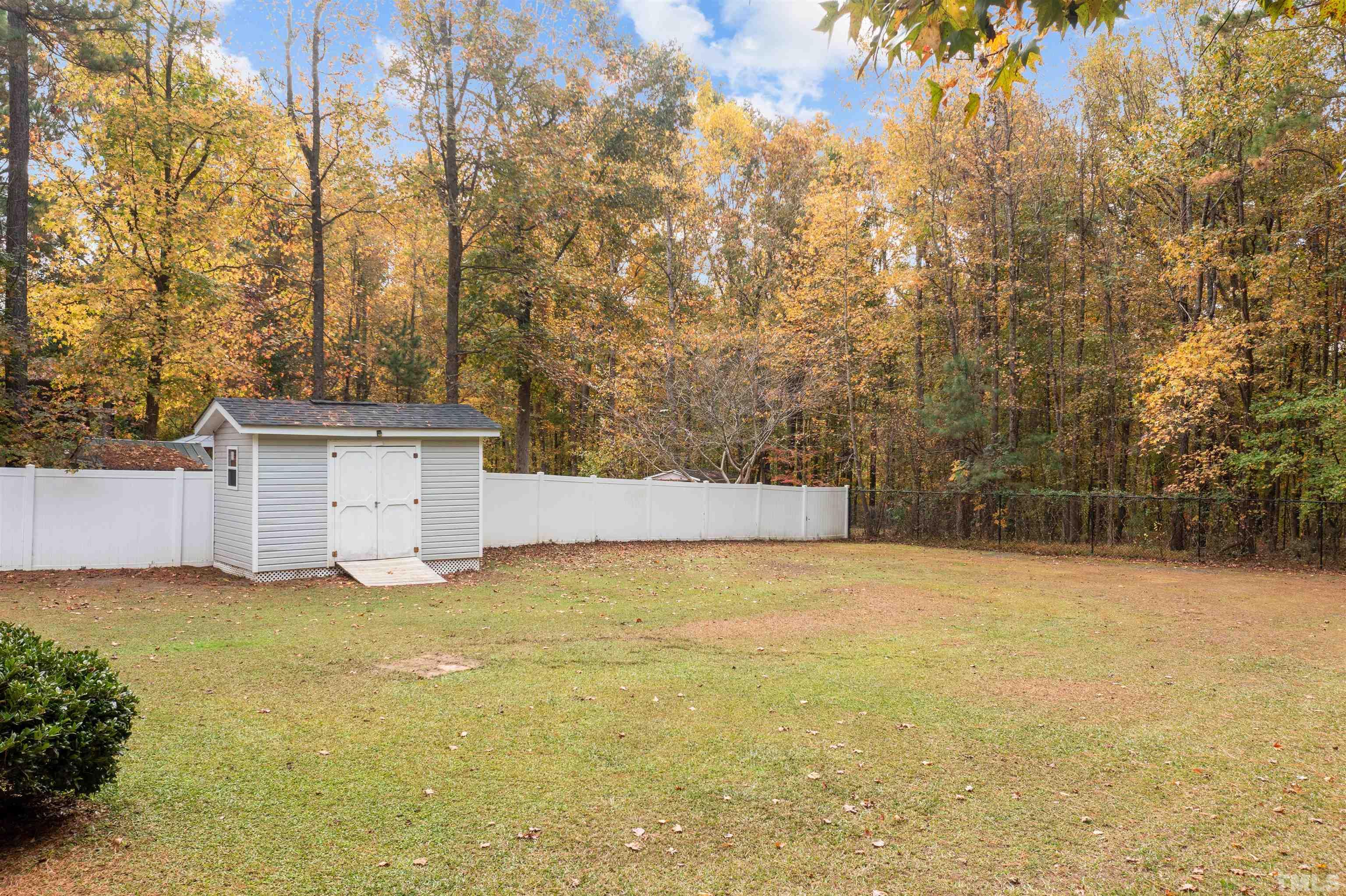 2710 Hurdover Road Apex, NC 27539 - Photo 46 of 52 a view of an outdoor space and a yard