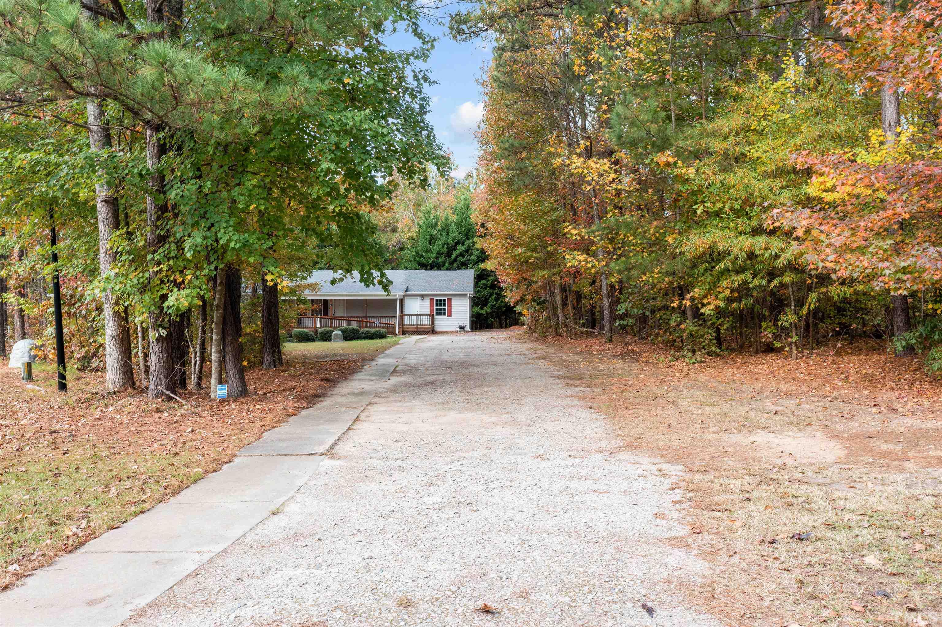 2710 Hurdover Road Apex, NC 27539 - Photo 48 of 52 a view of a yard with potted plants