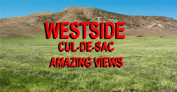 a sign that is on a brick wall