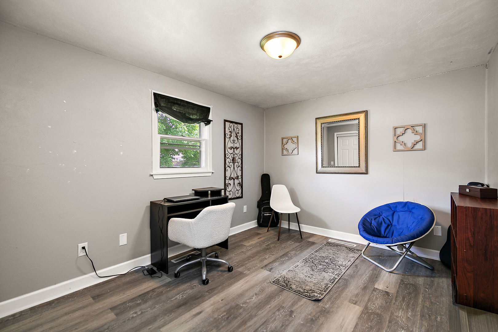 1572 North 2000E Road Bourbonnais, IL 60914 - Photo 11 of 18 a view of a workspace with furniture and a window