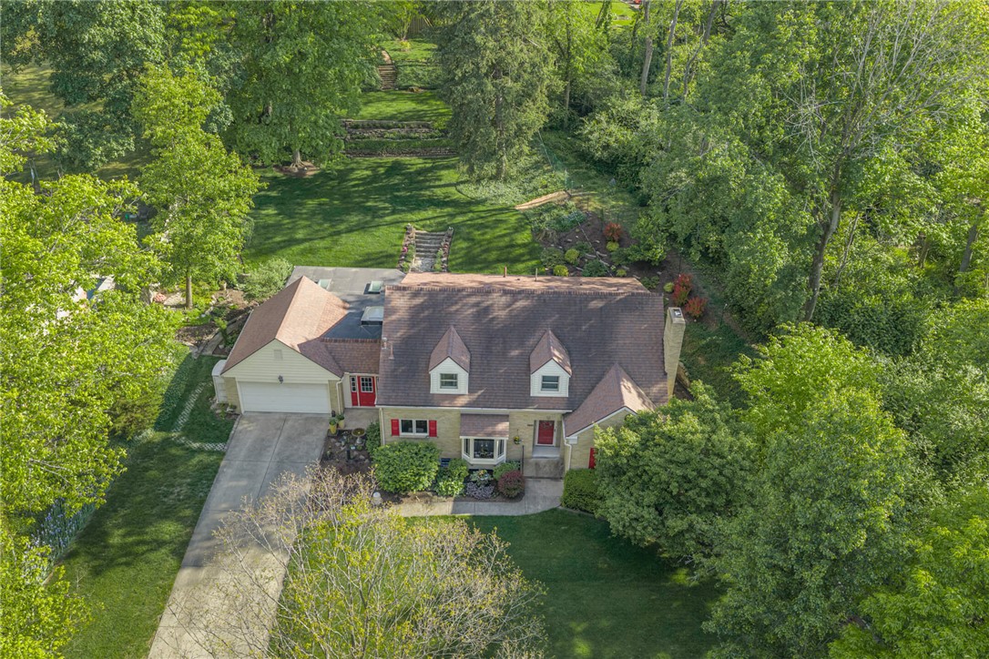 156 West Hadley Road Dayton, OH 45419 - Photo 60 of 71 This classic residence features a well-maintained exterior, a spacious driveway, and lush surroundings.