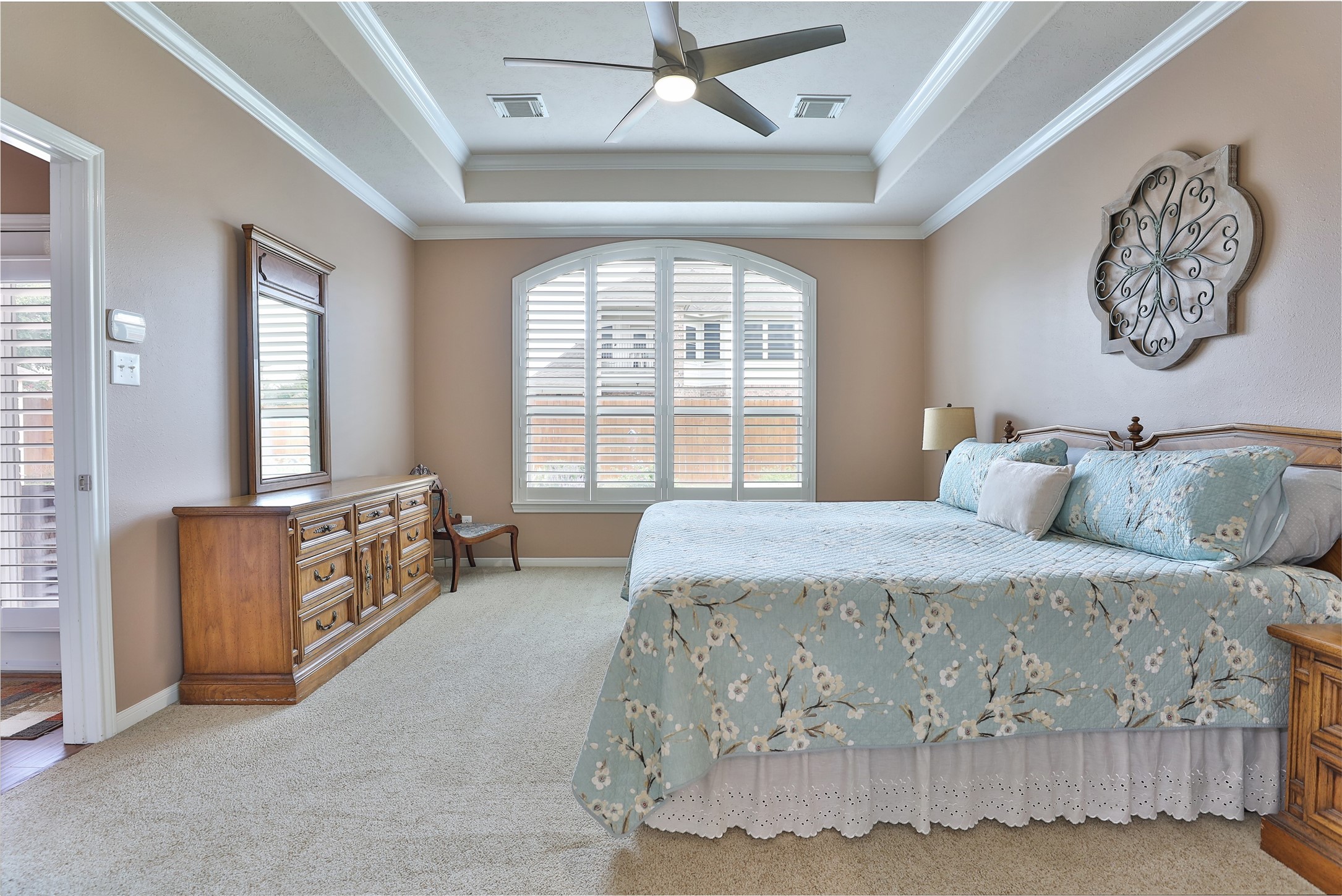 20519 Windrose Bend Drive Spring, TX 77379 - Photo 21 of 37 The owner's suite is conveniently situated apart from the secondary bedrooms; it is both spacious and inviting, and features a private en suite bathroom.