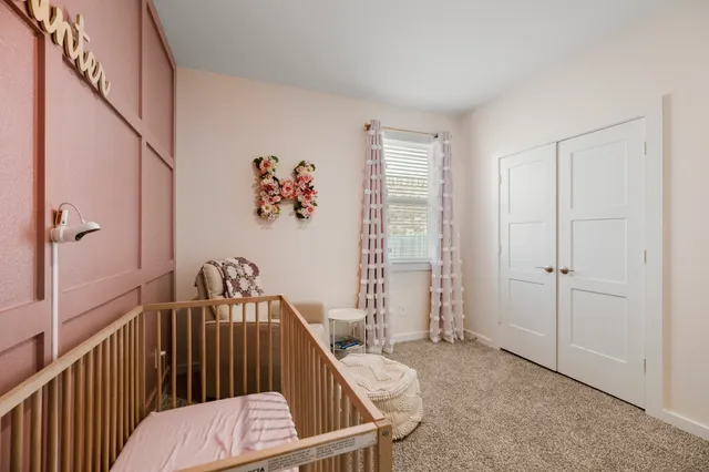 a view of a bedroom with furniture and staircase