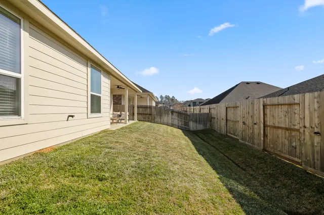 a bathroom with a sink and a yard