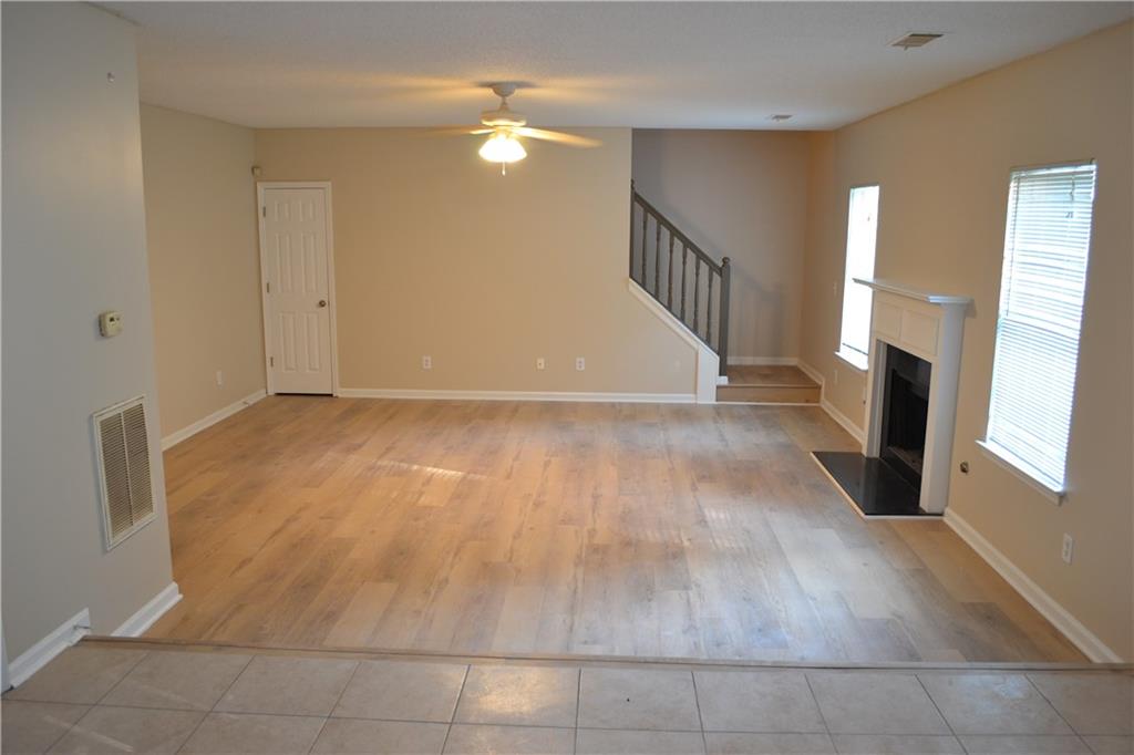 6157 Red Top Loop Union City, GA 30291 - Photo 11 of 26 a view of a livingroom with wooden floor