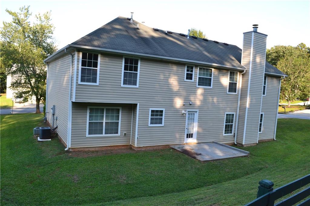6157 Red Top Loop Union City, GA 30291 - Photo 26 of 26 a view of a house with a yard