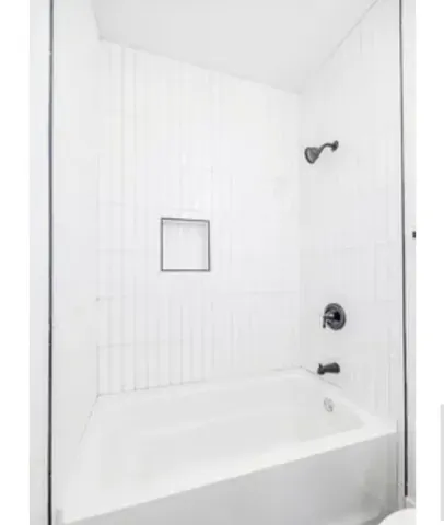 a bathroom with a bathtub