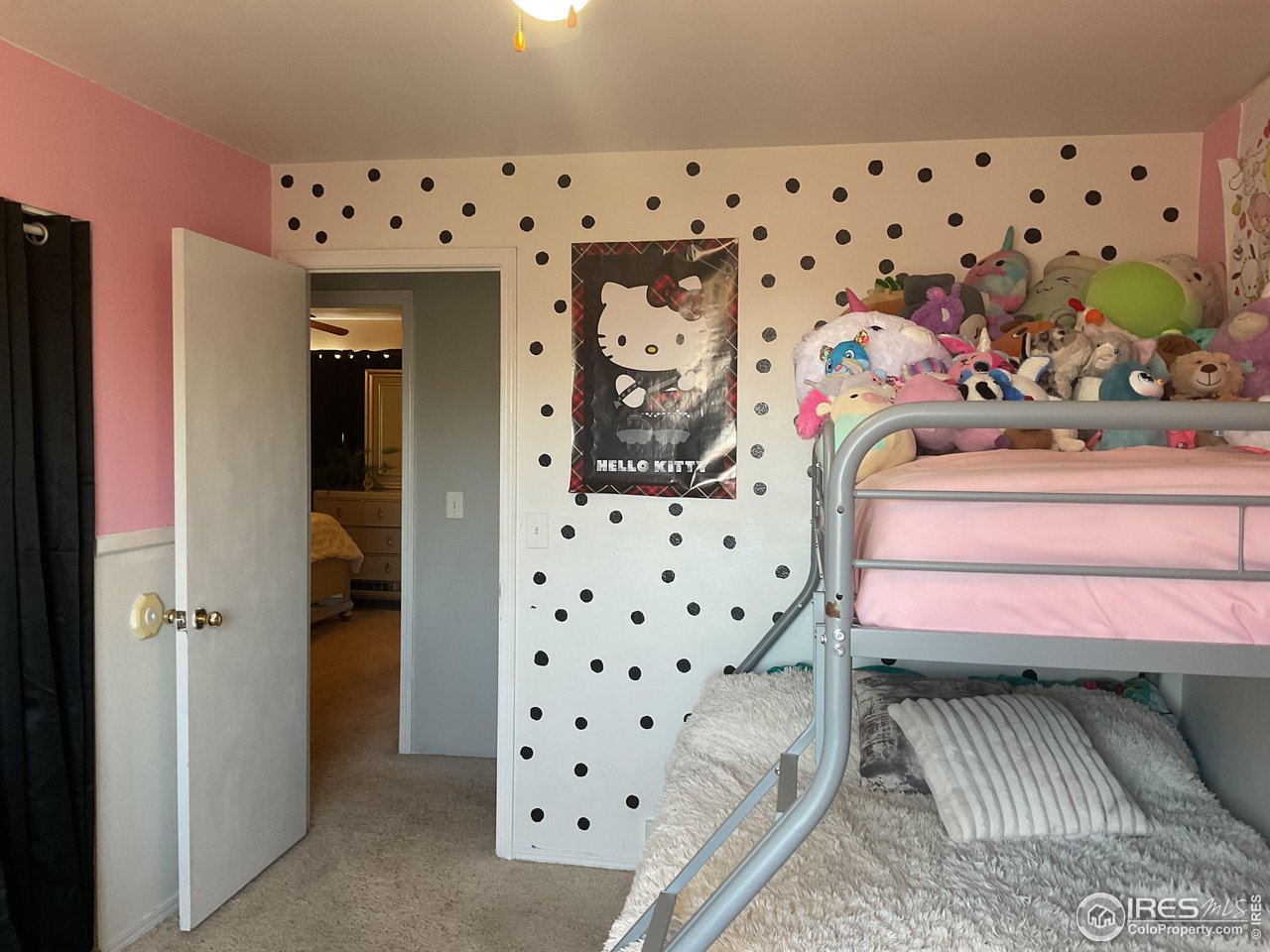402 Gayle Street Fort Morgan, CO 80701 - Photo 28 of 40 walk in closet with wooden floor