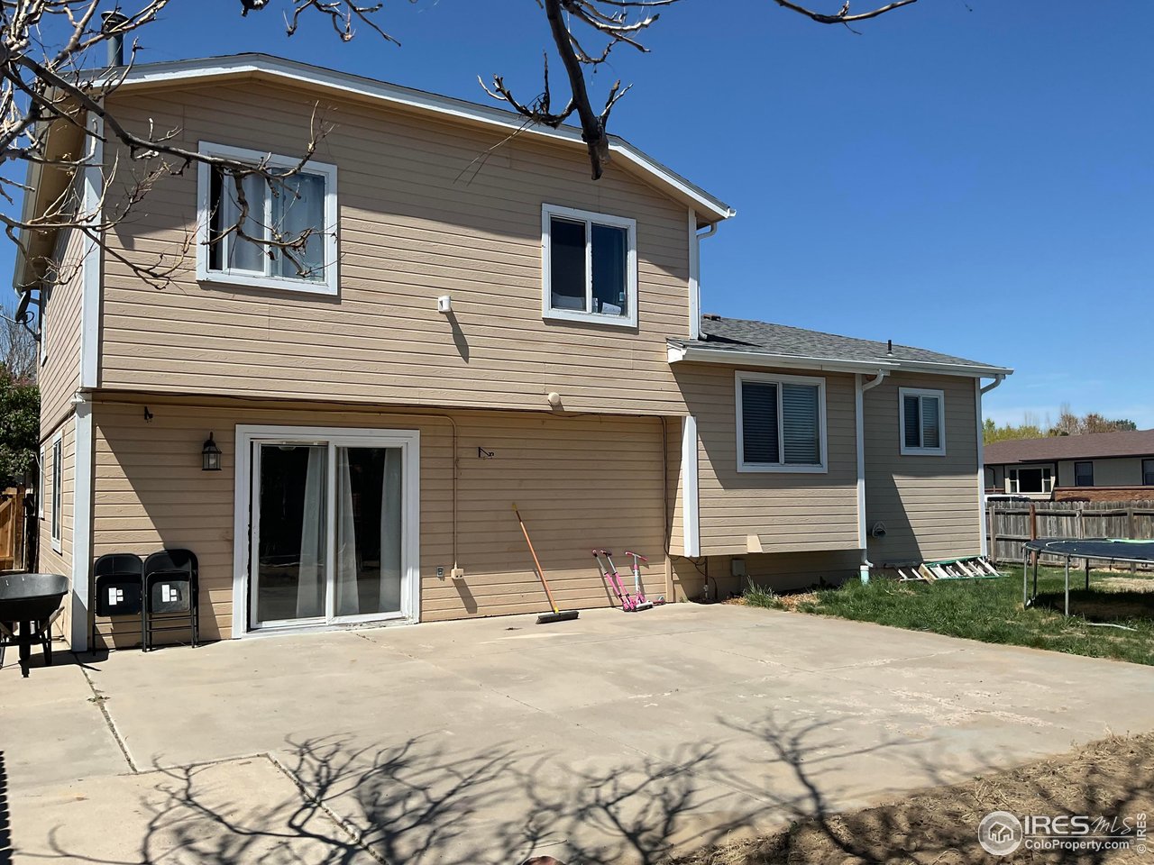402 Gayle Street Fort Morgan, CO 80701 - Photo 40 of 40 a front view of a house with a yard