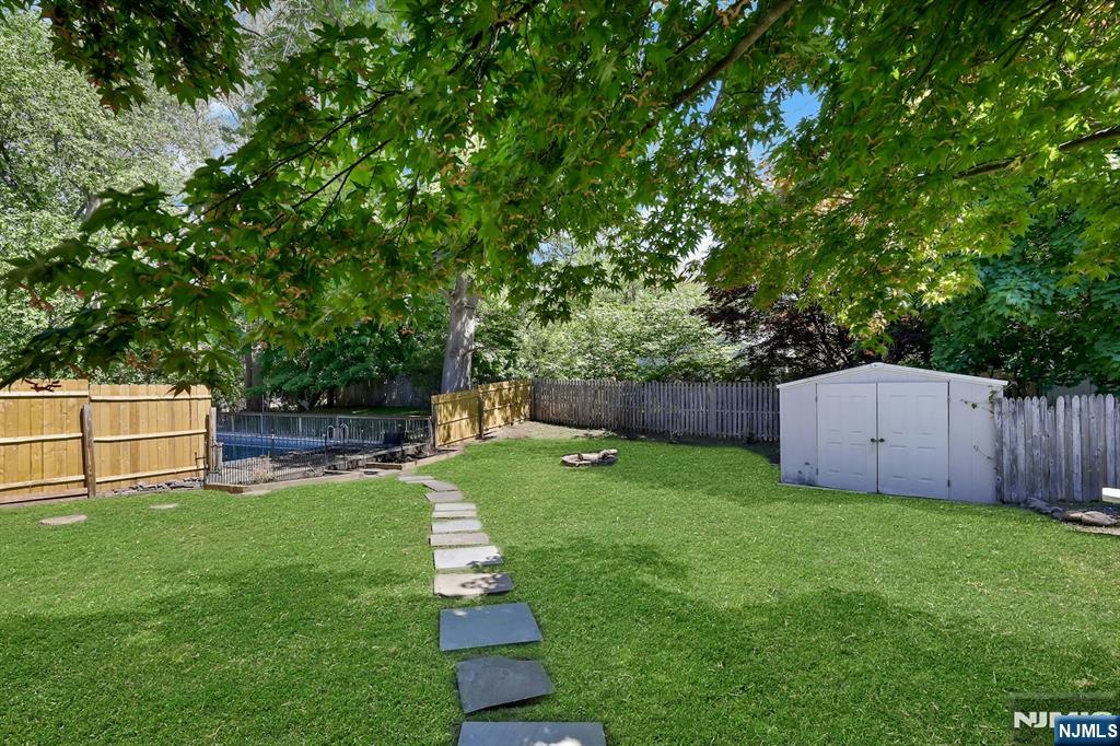 20 Blue Hill Road Norwood, NJ 07648 - Photo 48 of 49 a view of a backyard with a small cabin