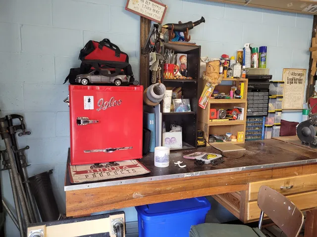 a room with lots of furniture and a bed