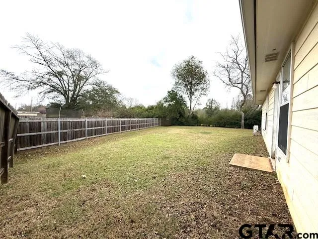 a view of a backyard with a garden
