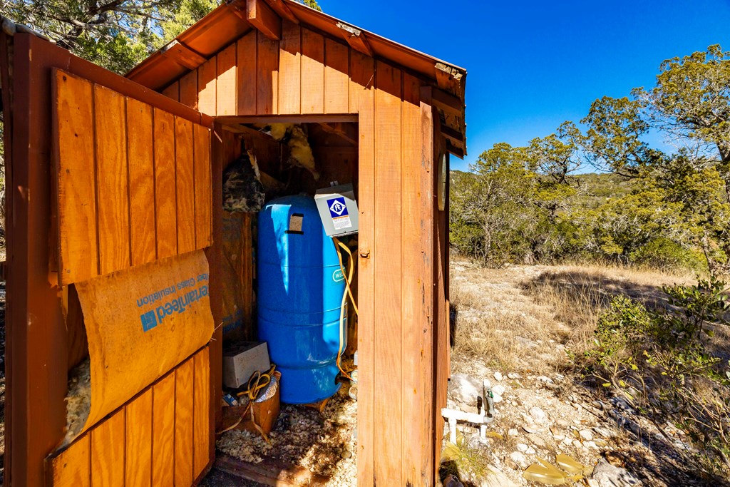3270 Indian Springs Road Barksdale, TX 78828 - Photo 14 of 16 a view of a house with a door