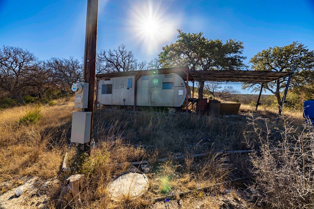 3270 Indian Springs Road Barksdale, TX 78828 - Photo 7 of 16 a view of a house with a yard