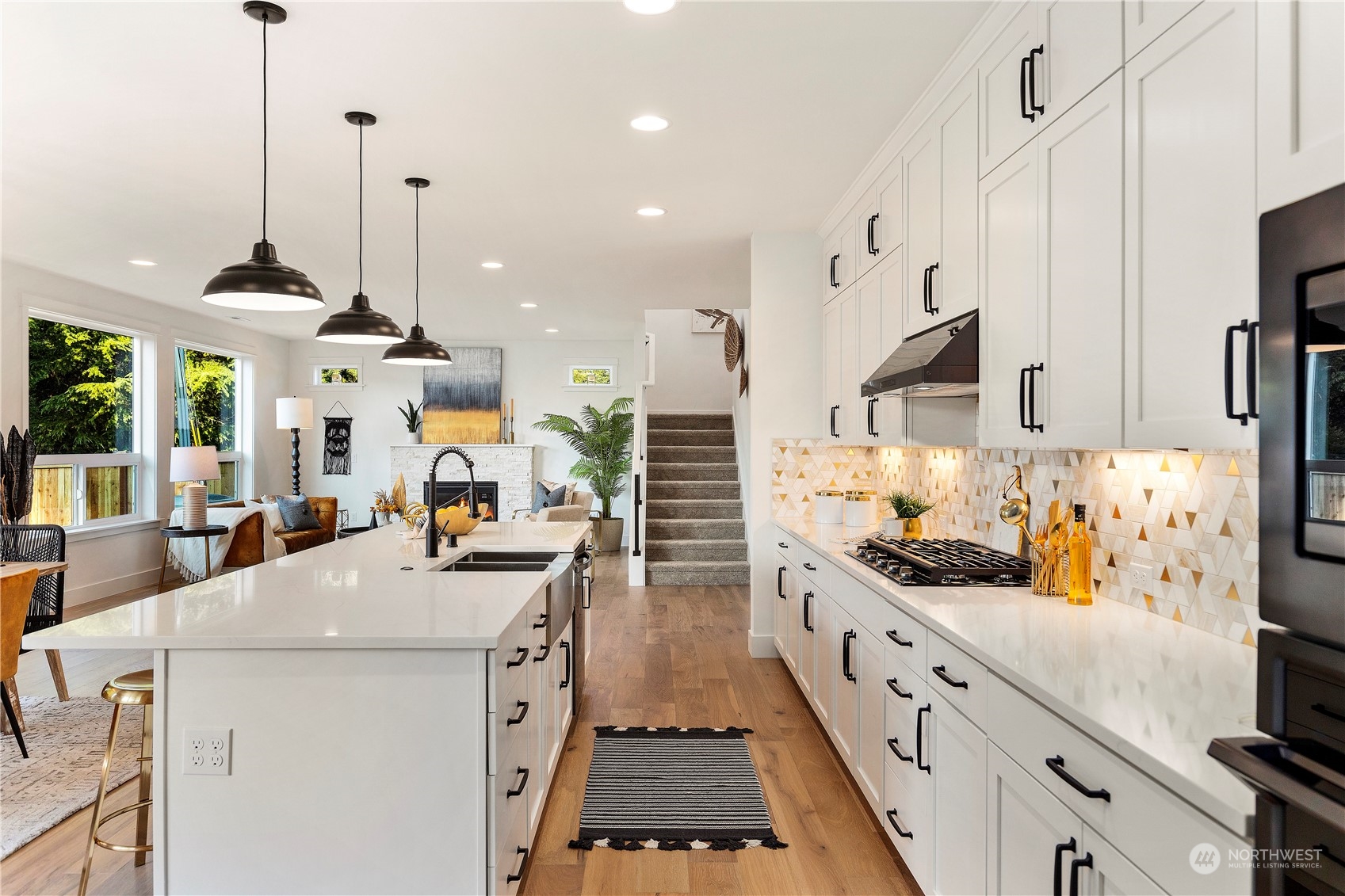 7 179th Place Southwest Bothell, WA 98012 - Photo 12 of 33 a kitchen with sink stove and refrigerator