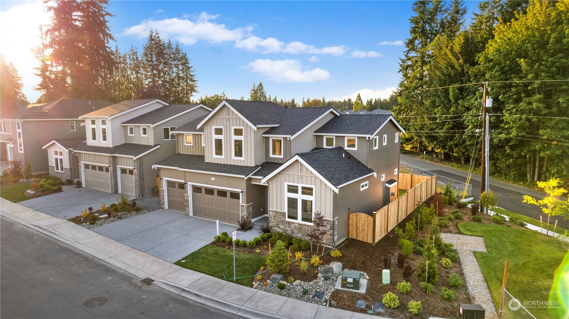7 179th Place Southwest Bothell, WA 98012 - Photo 2 of 33 a front view of a house with garden