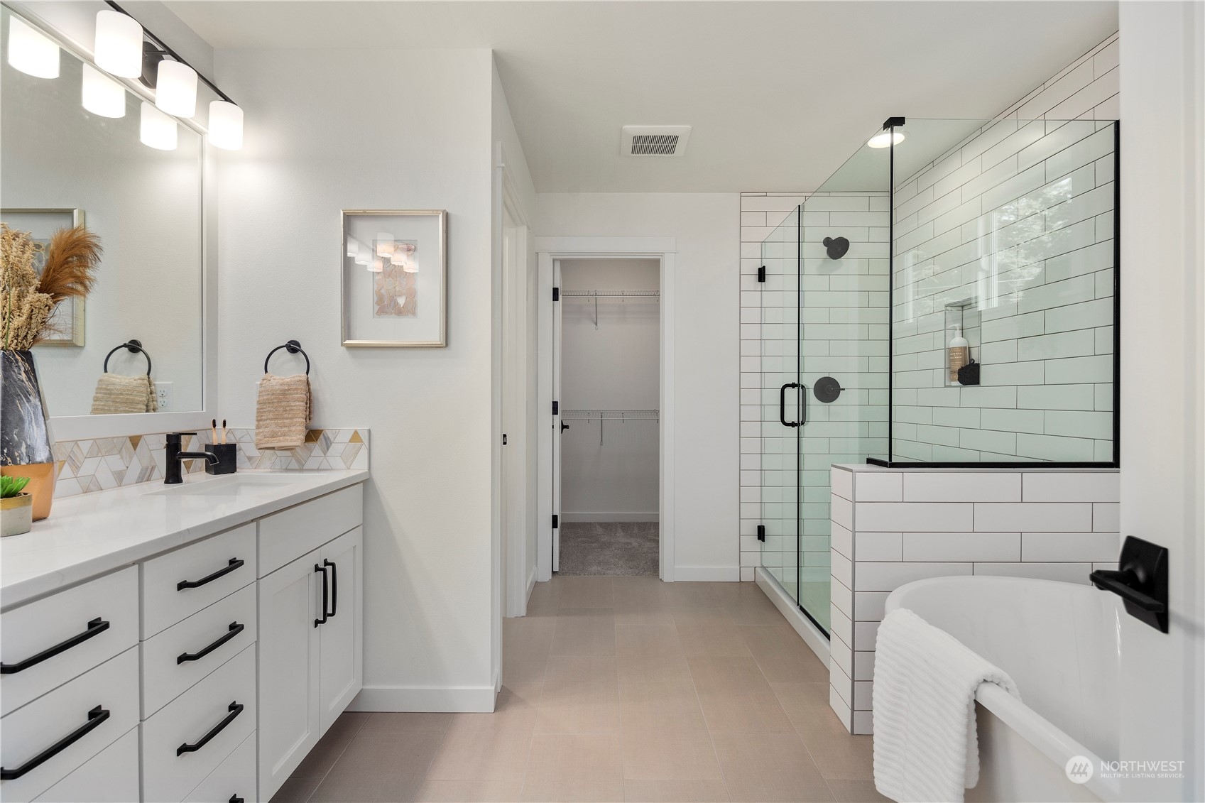 7 179th Place Southwest Bothell, WA 98012 - Photo 22 of 33 a bathroom with a sink a toilet a shower and a mirror