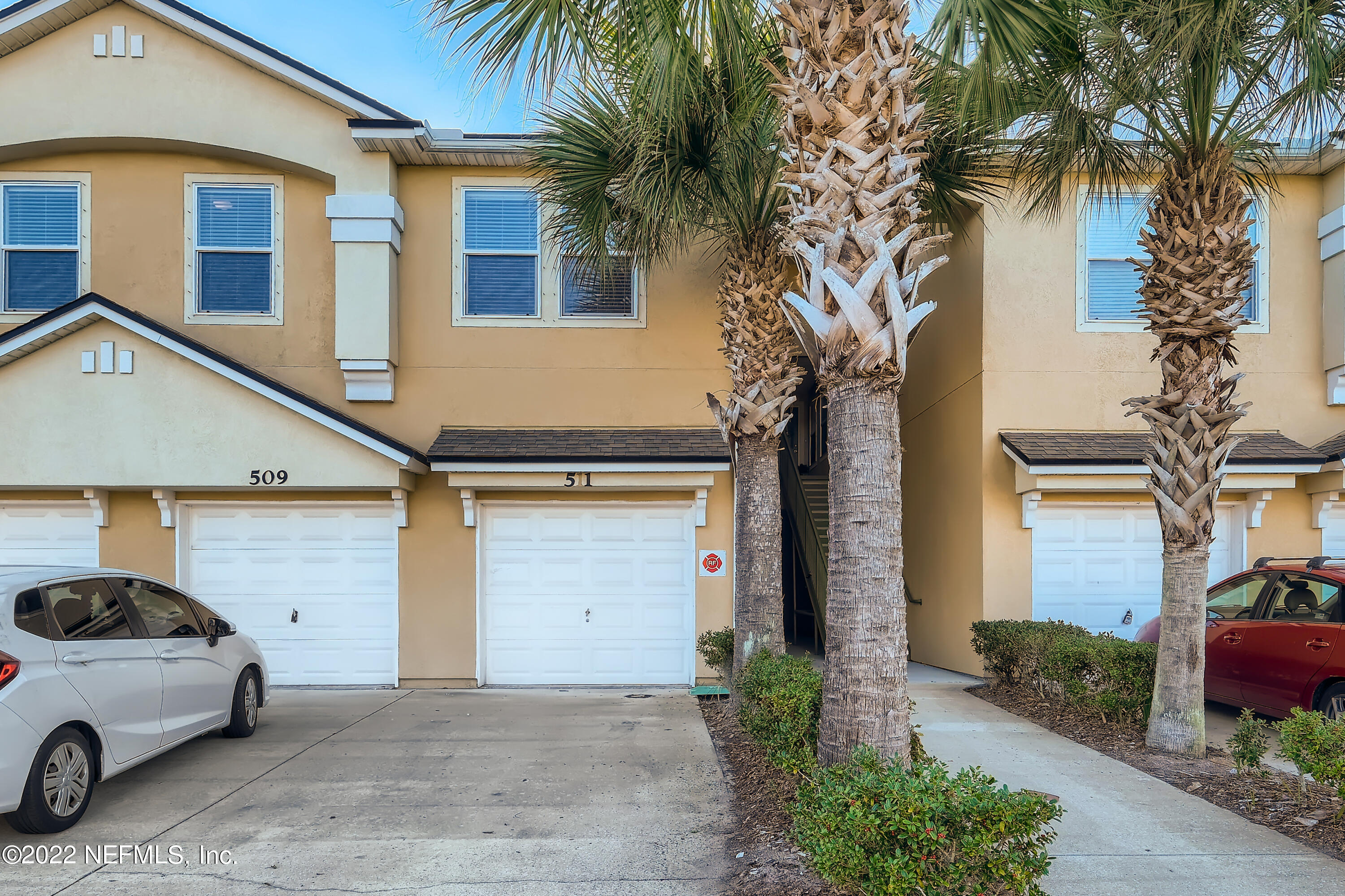 511 Golden Lake Loop St. Augustine, FL 32084 - Photo 1 of 32 a view of a car parked in front of a house