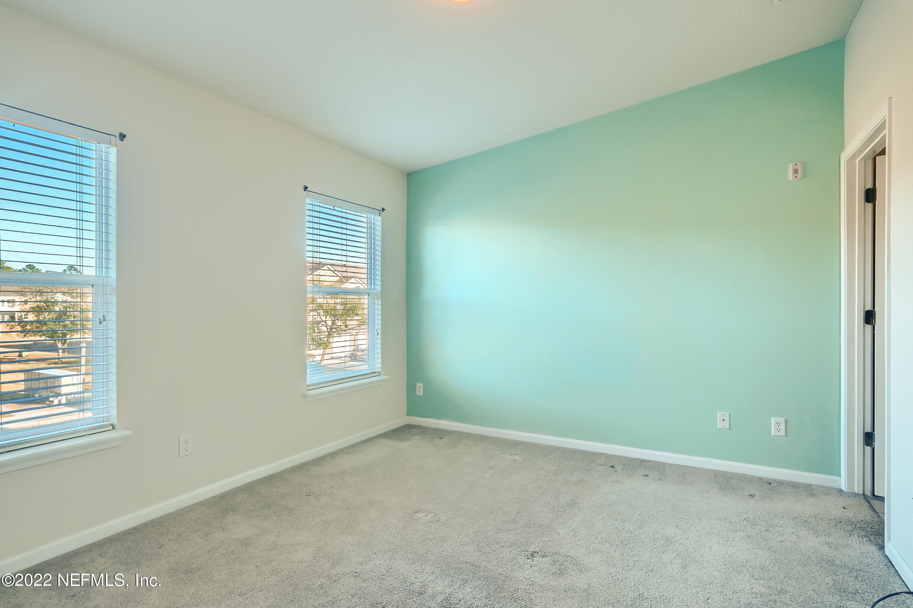 511 Golden Lake Loop St. Augustine, FL 32084 - Photo 14 of 32 an empty room with windows