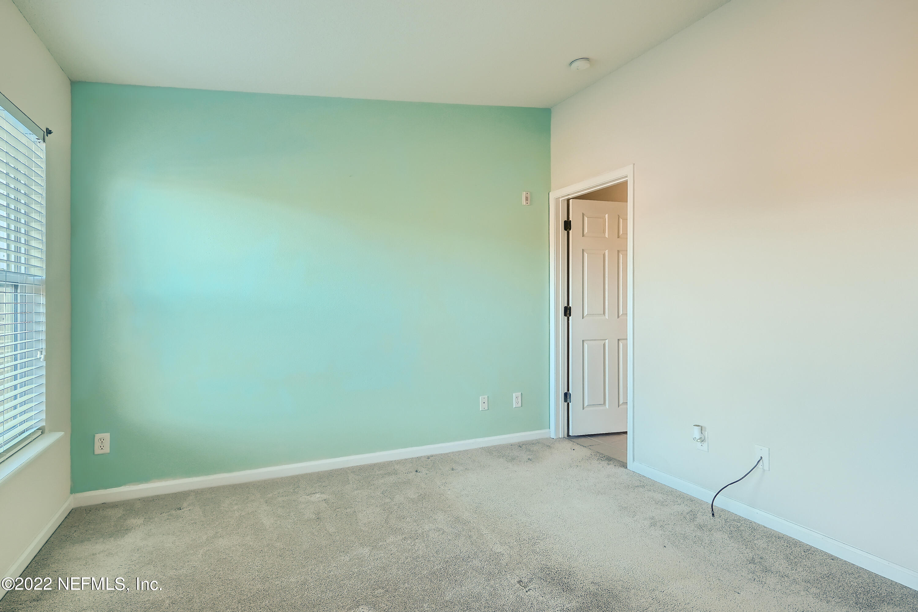 511 Golden Lake Loop St. Augustine, FL 32084 - Photo 15 of 32 an empty room with windows