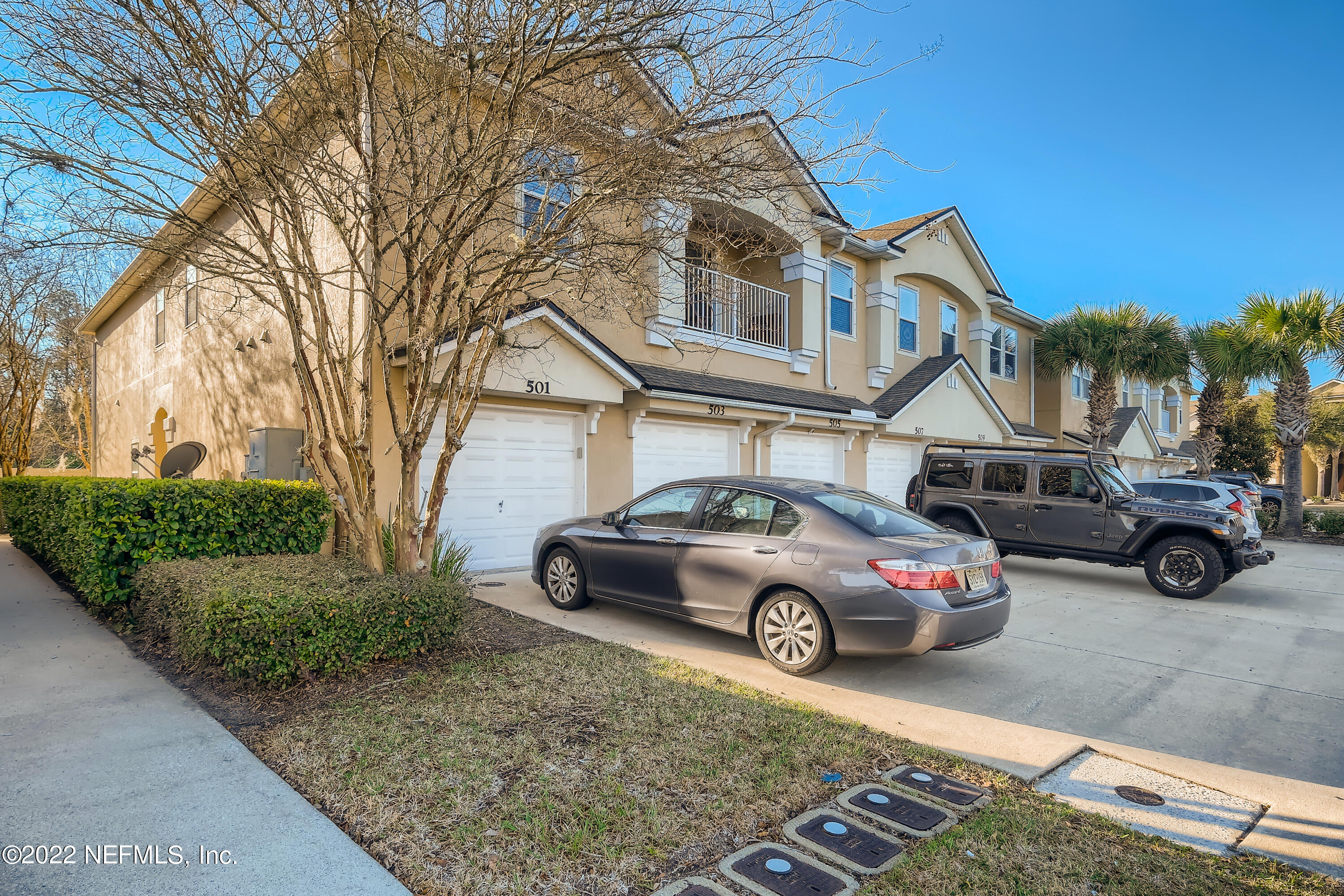 511 Golden Lake Loop St. Augustine, FL 32084 - Photo 2 of 32 a car parked in front of a house