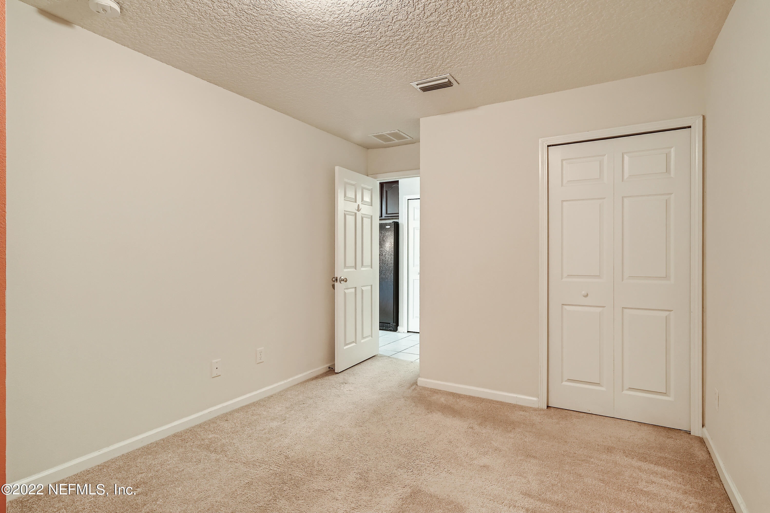 511 Golden Lake Loop St. Augustine, FL 32084 - Photo 22 of 32 a view of an empty room