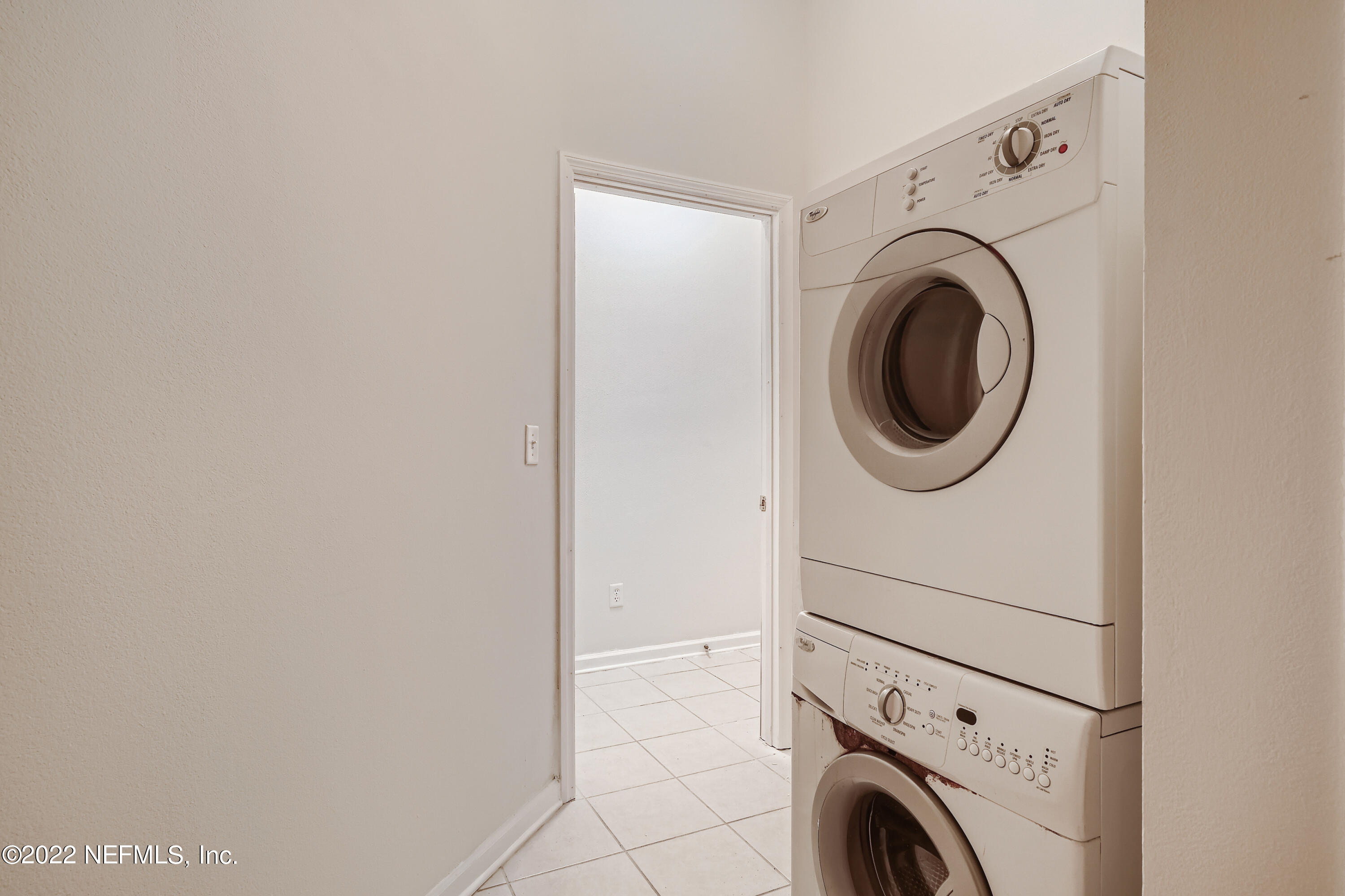 511 Golden Lake Loop St. Augustine, FL 32084 - Photo 24 of 32 a view of a storage & utility room with dryer and washer