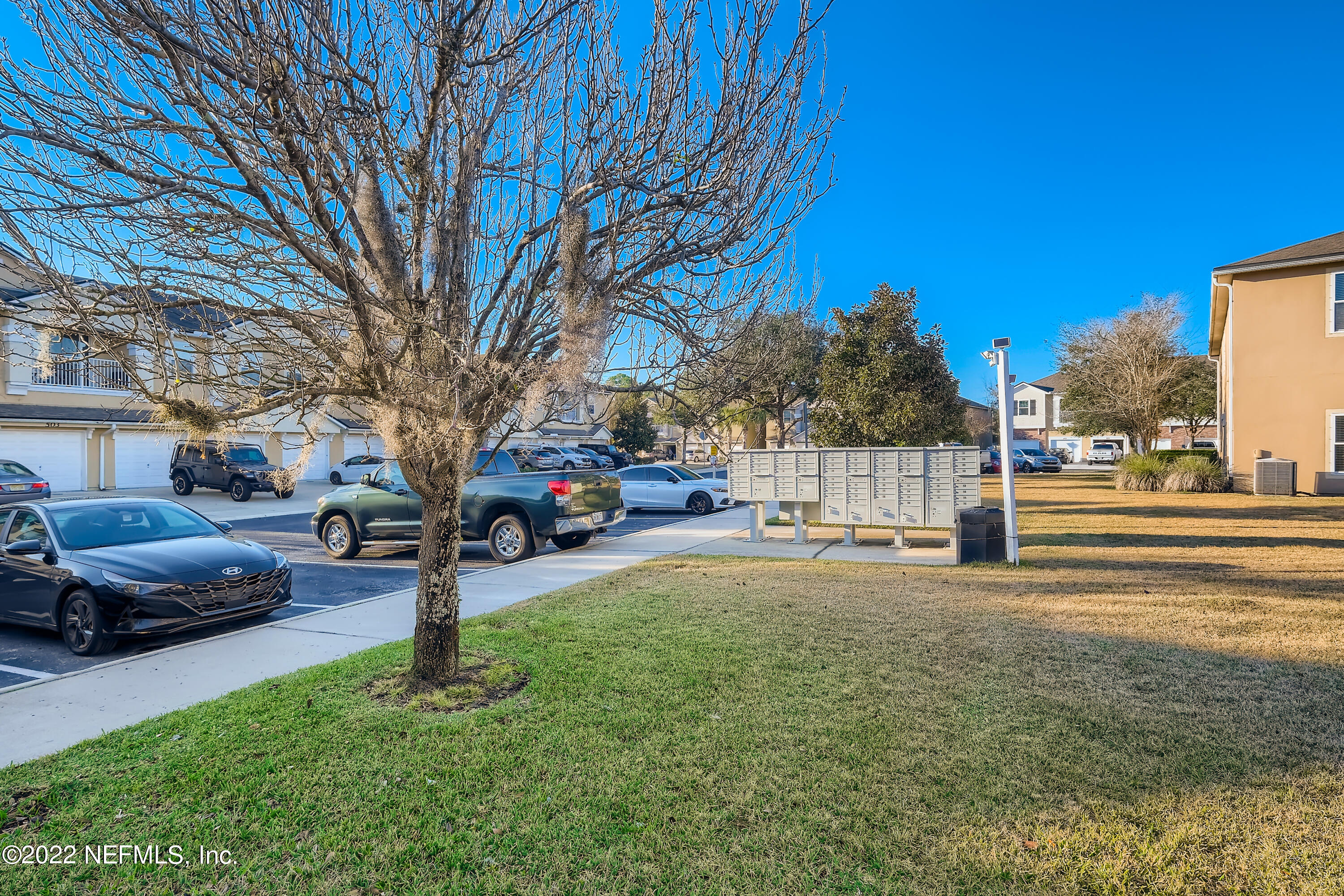 511 Golden Lake Loop St. Augustine, FL 32084 - Photo 30 of 32 a view of a yard with cars on road