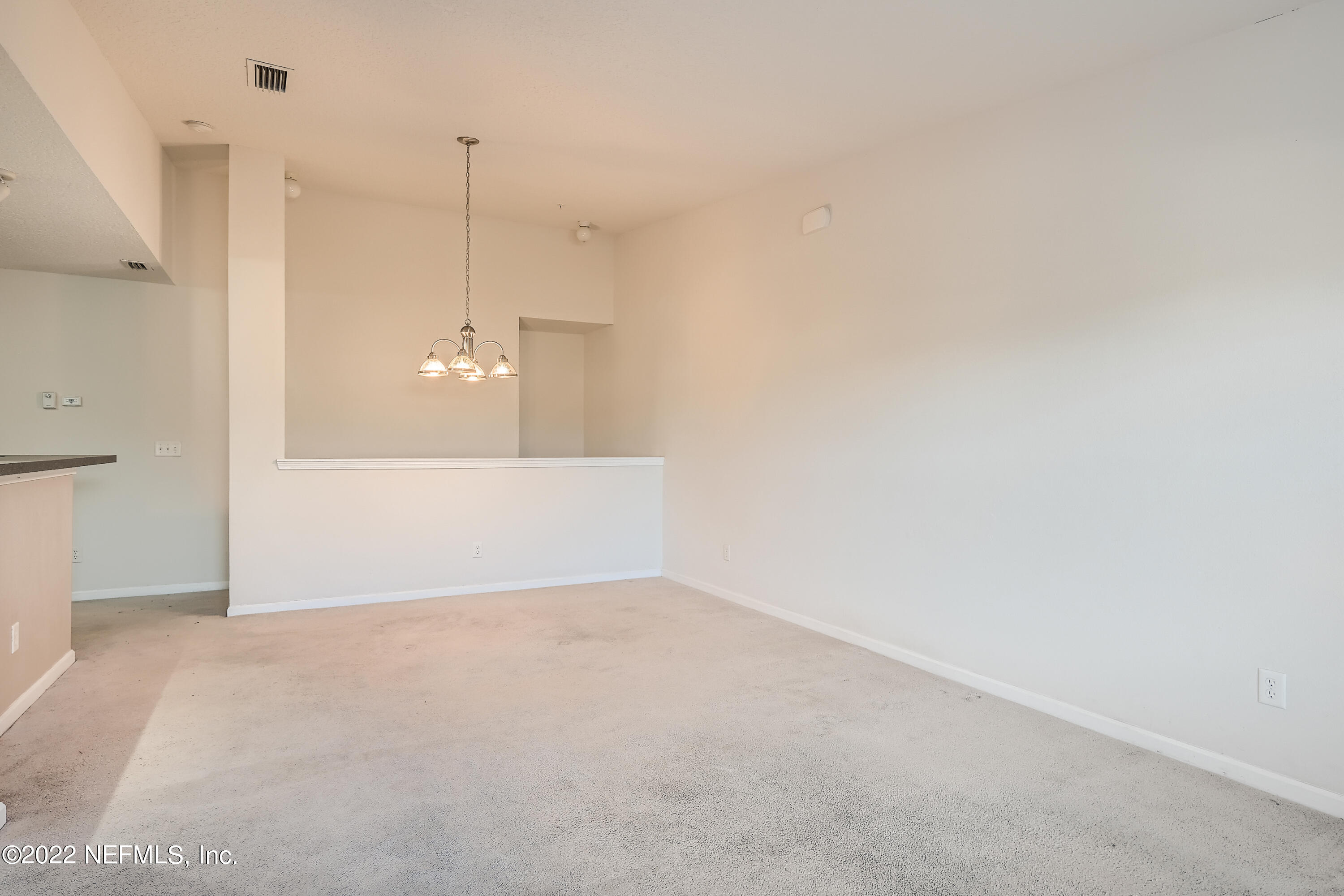 511 Golden Lake Loop St. Augustine, FL 32084 - Photo 9 of 32 a view of a room with a ceiling fan and window